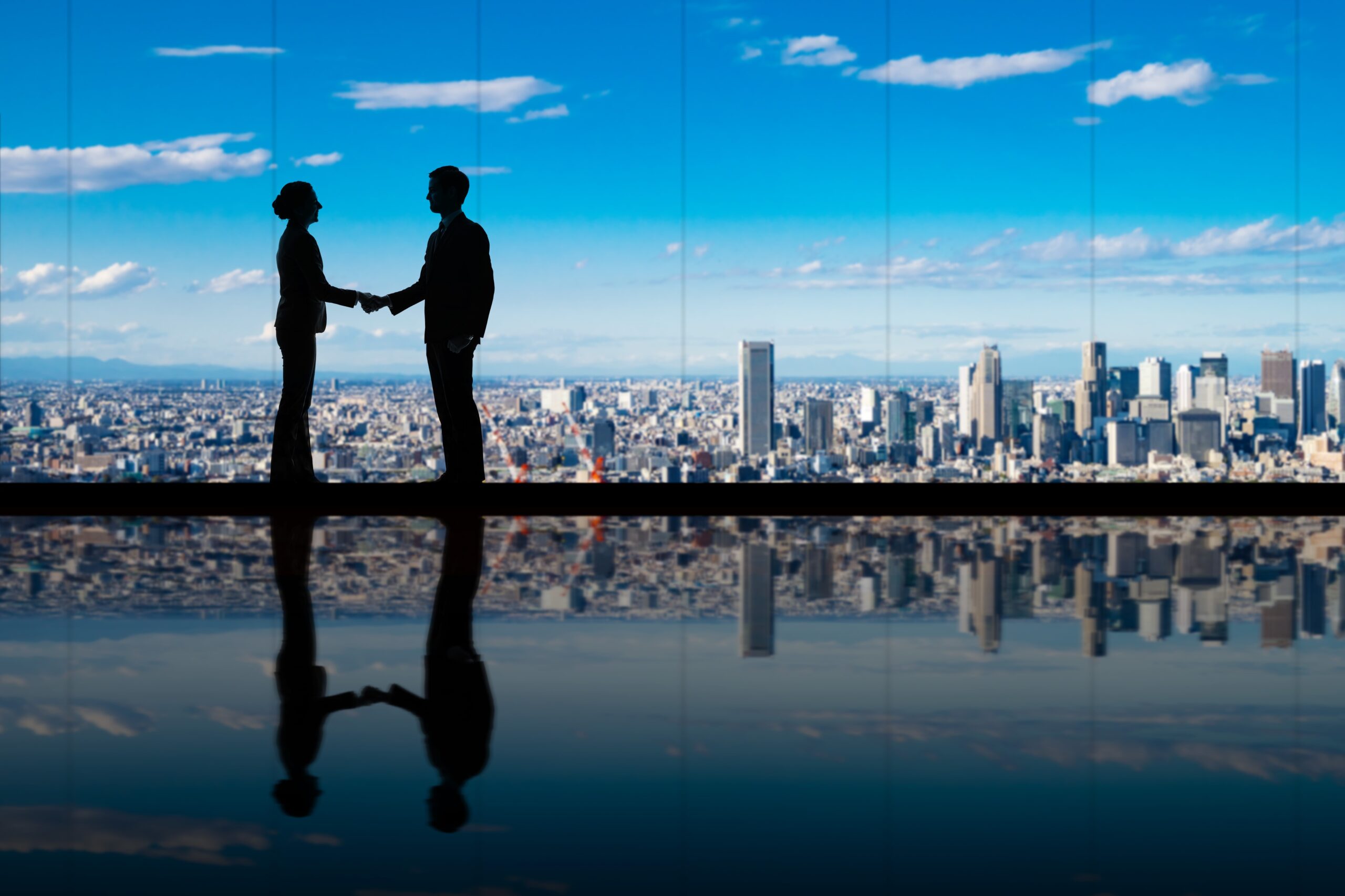 Group of businessperson in front of the city.